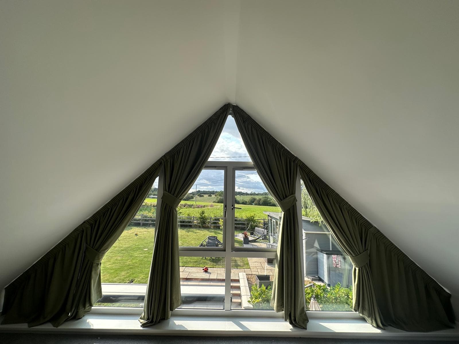 Triangular Window curtain inspiration